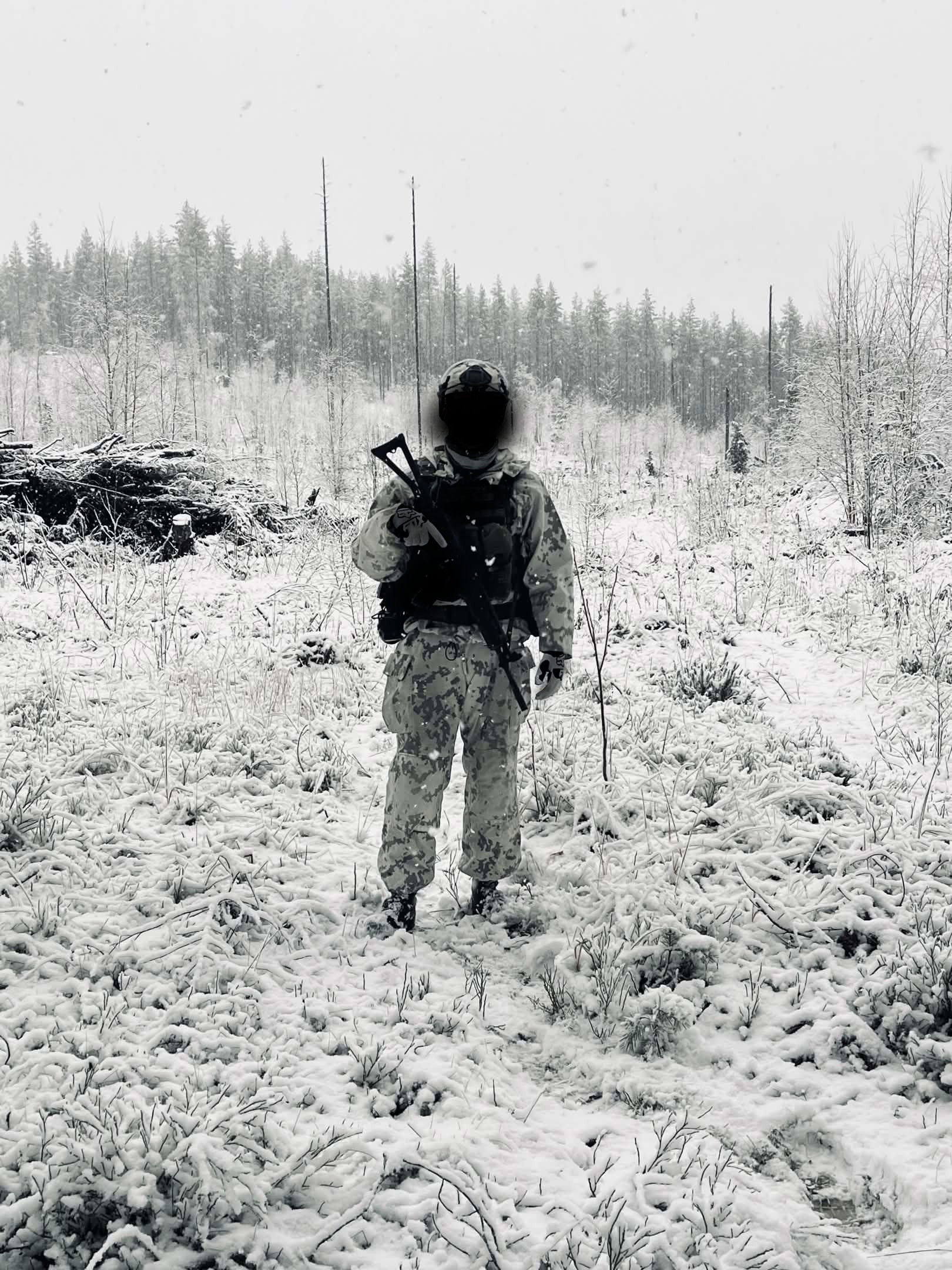 Soldier in snowy field